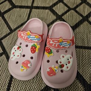 Pink croc shoes